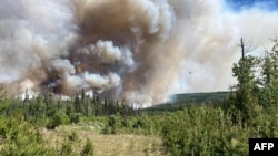 برٹش کولمبیا کے علاقے ڈوسن کریک میں آگ سے ہزاروں ایکٹر پر پھیلے ہوئے جنگلات خاکستر ہو چکے ہیں اور لگ بھگ 20 ہزار افراد کو اپنا گھر بار چھوڑ کر محفوٖظ مقامات پر جانا پڑا ہے۔ 7 جون 2023