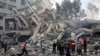 غزہ شہر میں اسرائیلی فضائی حملوں کے بعد ایک تباہ شدہ عمارت، فوٹو اے پی، 19 اکتوبر 2023