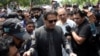 سابق وزیراعظم عمران خان اسلام آباد ہائی کورٹ میں پیش ہونے کے لیےآ رہے ہیں۔ فائل فوٹو