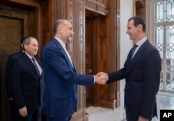 شام کے صدر بشار الاسد دمشق میں ایرانی وزیر خارجہ حسین امیر عبد الہیان سے ملاقات کر رہے ہیں ، فوٹو اے پی 8اپریل 2024